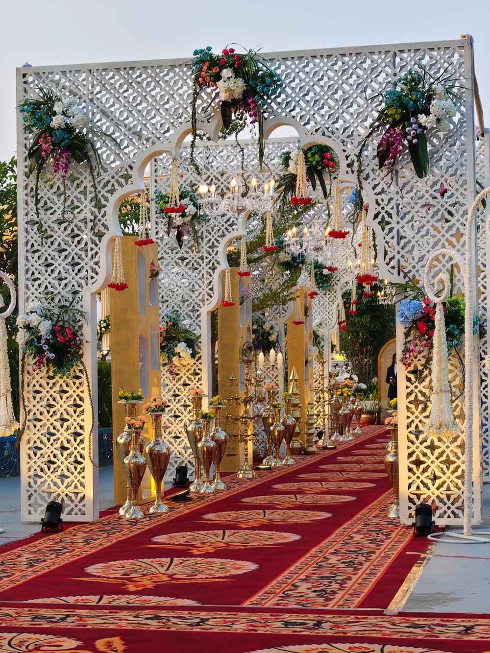 Bright floral wedding decor with a painted backdrop